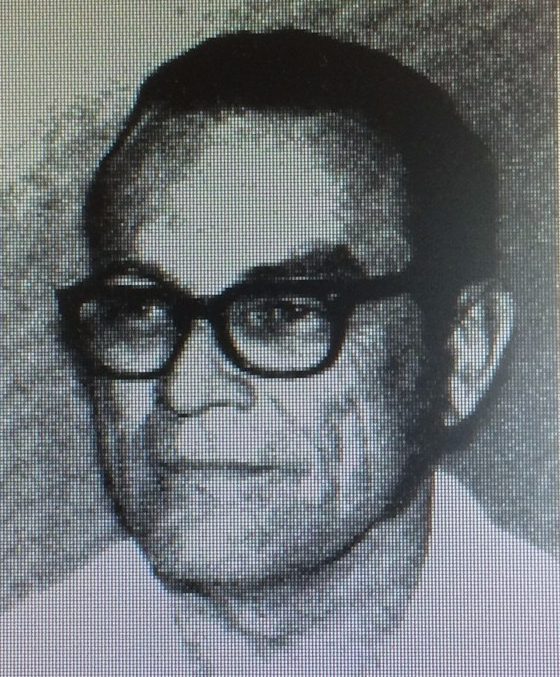 Black and white portrait of a man.