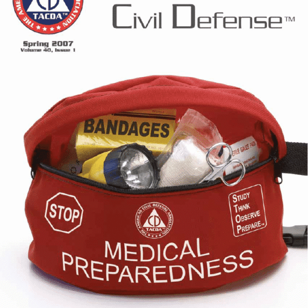 A red bag with medical supplies inside of it.