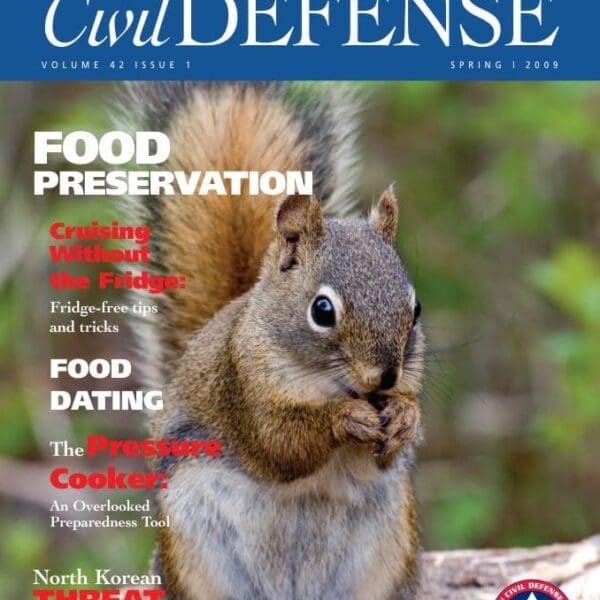 A squirrel is standing on the cover of civil defense magazine.