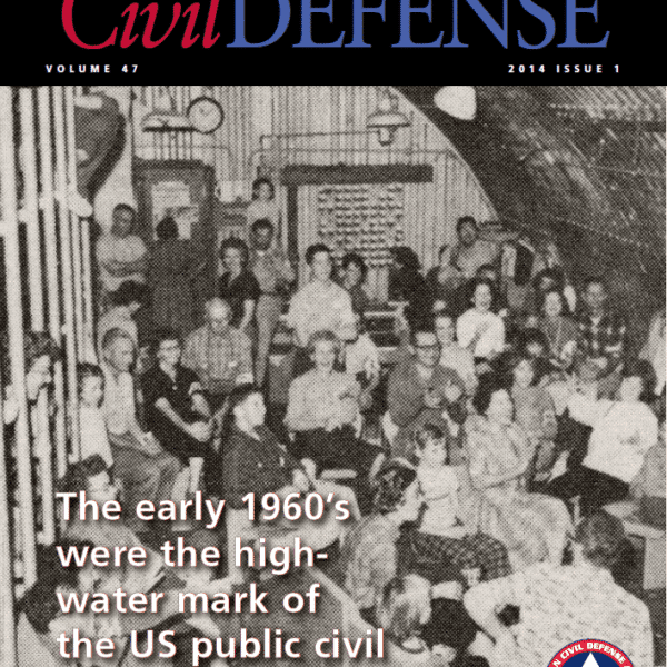 A black and white photo of people in a building.