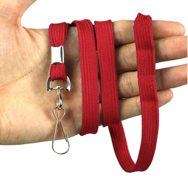 A person holding onto a red lanyard