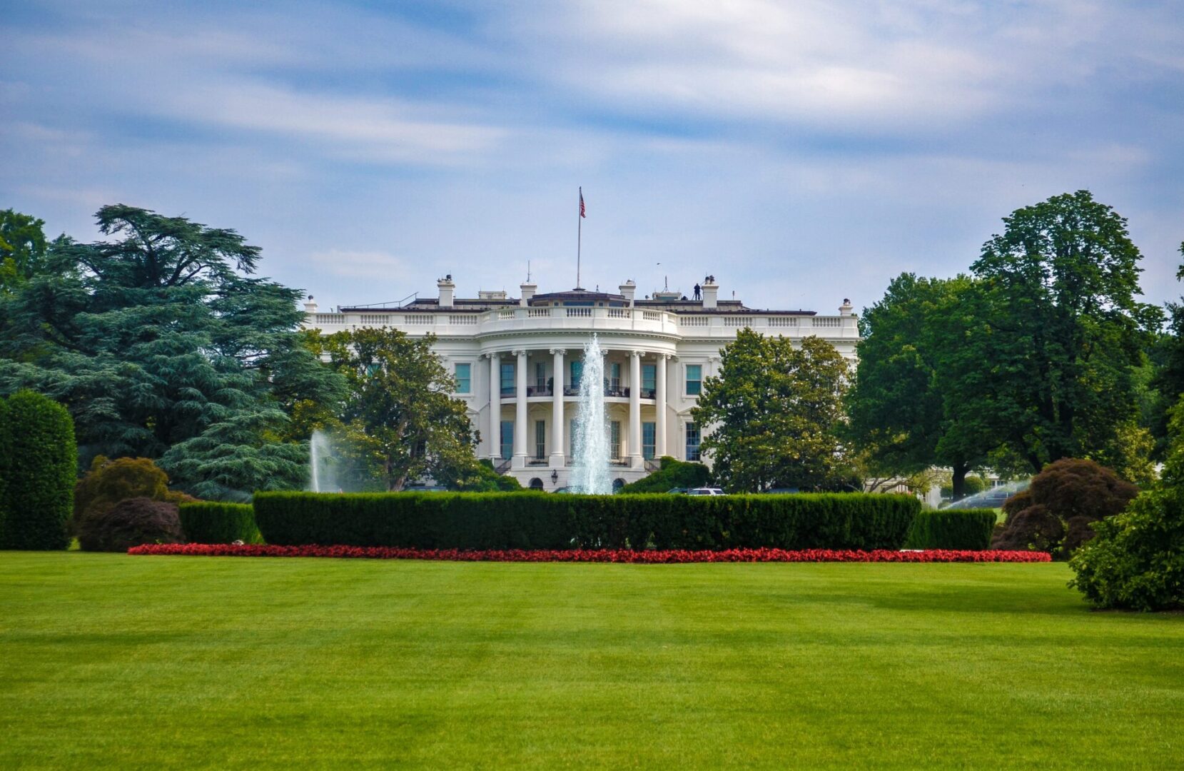 A view of the white house from across the lawn.