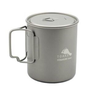A silver mug with a handle and lid.
