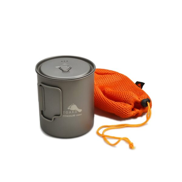 A metal cup with orange bag on the side.