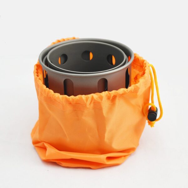 A small orange bag with two pots inside of it.