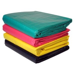 A stack of four different colored tarps.
