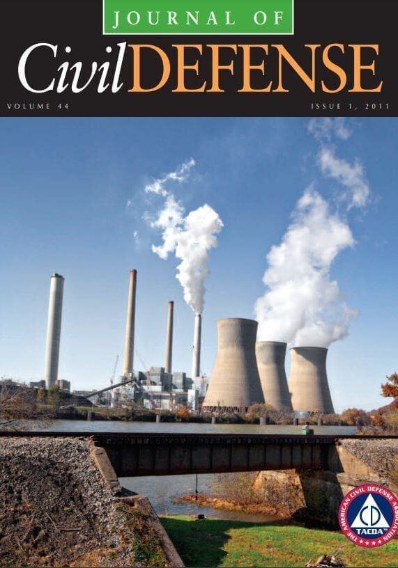 A cover of civil defense magazine with smoke coming from the stacks.